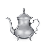 Angled Side View of Plain Brass Teapot - Glossy Silver with Open Top