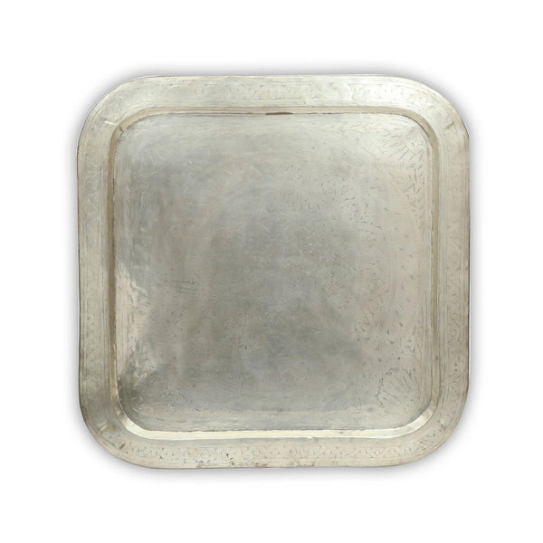 Table Top View of Squared Antique Brass Table - Silver Showcasing Intricate Carving Work