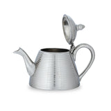 Side View of Striped Brass Teapot with Open Top